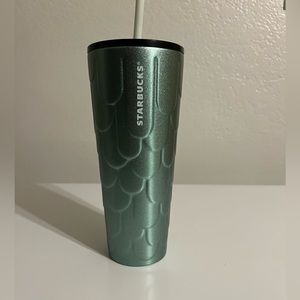 Mermaid tail metal cup.